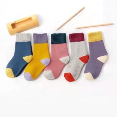 China The new sports winter woolen ring socks for boys and girls together color thickened cold children's socks for sale