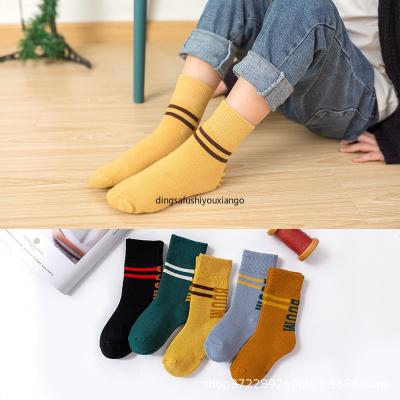 China Sports socks wholesale horizontal children's letter band wool ring during the winter of tube socks assembling and long thickening boy baby tube for sale