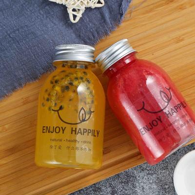 China food & Pet Juice Bottle Cute Plastic Bottle Empty Plastic Juice Pet Bottles With Lid Beverage Packing Pet Pump Bottle 250Ml for sale