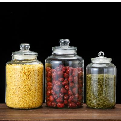 China Sustainable Hot Selling 900Ml Food Grade Transparent Storage Glass Jar For Kitchen for sale