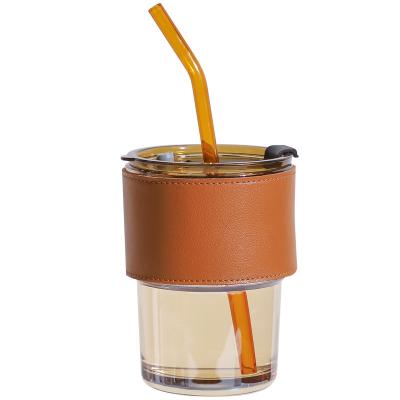 China PORTABLE Glass Tumbler With Silicone Sleeve, Glass Iced Coffee Mug, Reusable Hot and Cold Cup for sale