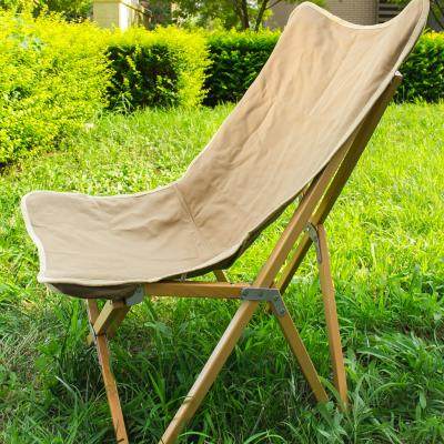 China 2021 Outdoor Wood Folding Fishing Chair Mounthood Canvas Beach Lounger for sale