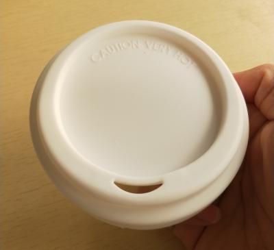 China Viable hot sale new moon shape food grade silicone coffee cup reusable lid with 90mm for sale