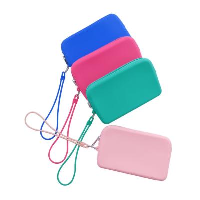 China Eco-friendly silicone custom long coin purse large new product multifunctional capacity storage with bracelet rope girl bag for sale