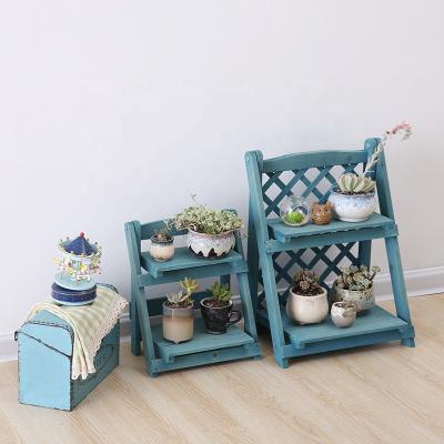 China Europe 2 Tier Folding Free Installation Flower Pots Stand Up Display Wooden Plant Rack for sale