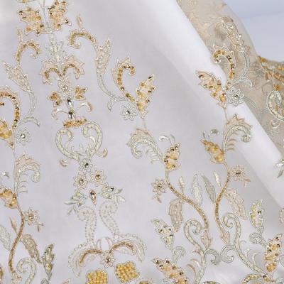 China Sustainable High Quality Luxury Hand Made Beads French Tulle Mesh 100%Polyester Lace Fabric For Bridal for sale