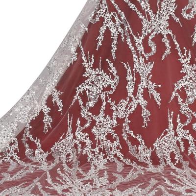 China Other White Swiss Luxury Sequin Tulle Hot Selling Net Machine Beaded Lace Fabric For Bridal for sale