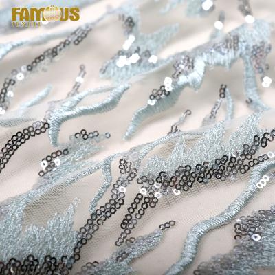 China Other Luxury Lightweight Custom Logo Fancy Embroidery Tulle Lace Fabric With Sequin for sale