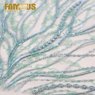 China Other Sequin Knitted Lace Fabric 100% Tulle Dress Wedding Kids Embroidery Polyester Low Moq 5 Yards for sale