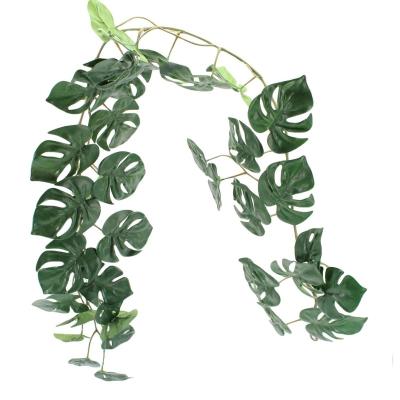 China Handmade Decorative Faux Stems Artificial Plants Plastic Leaves Real Touch Wall Hanging Monstera Leaf Vine Silk Greenery Garland for sale