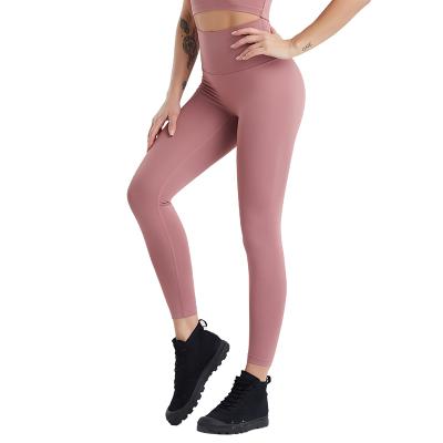 China New Style Top Quality Women Yoga Pants Peaches Buttock Tight Gym Butt Lift High Quality Seamless Breathable Gaiters for sale