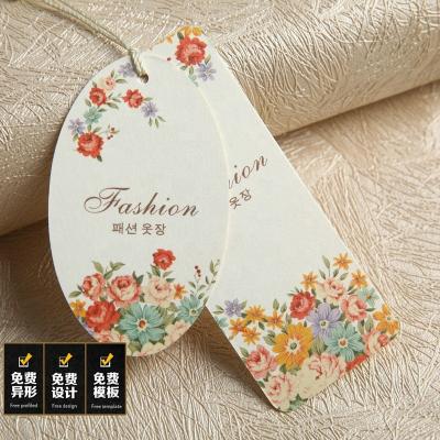 China China Viable Factory Garment Accessories Custom Embossed Logo White Matte Paper Clothing Hangtag for sale