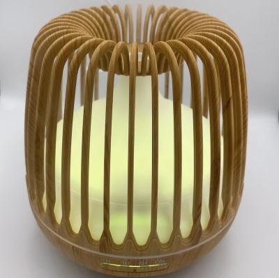 China Car 7 Colors LED Hollow Out Ultrasonic Birdcage Humidifier Aromatherapy Essential Oil Diffuser for sale