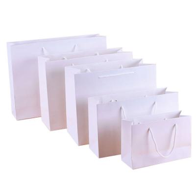 China Low Price Recyclable Christmas Gift Paper Luxury White Kraft Bags Paper Box For Shopping And Gifts for sale