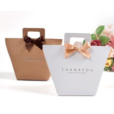 China Latest Recyclable Modern Custom Black Portable Shopping Bag Manufacturers Paper Bags for sale