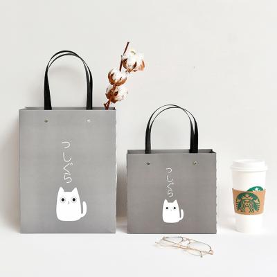 China Recyclable Nordic Style Gift Luxury Simple Portable Paper Bag for sale