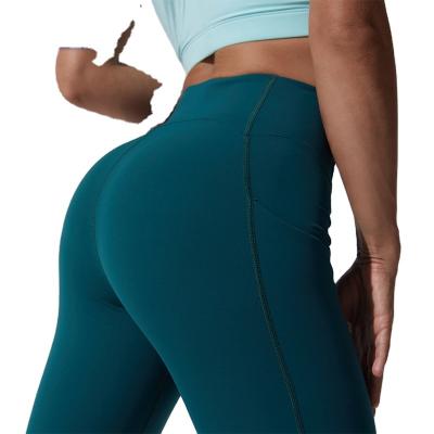 China Breathable Custom Fitness Biker Shorts Ladies Workout Sportswear Shorts On Gym Yoga Sports Shorts With Pockets for sale