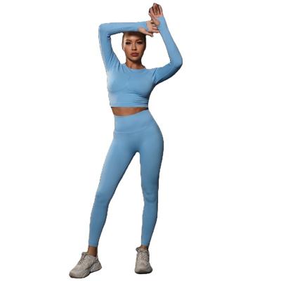 China New QUICK DRY Women's Peach Seamless Pleated Hip Rollover Tight Yoga Set Yoga Running Set Sports Fitness Customizable LOGO for sale