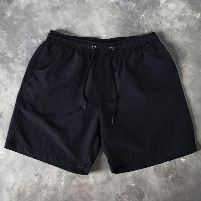 China Anti-Wrinkle Wholesale Custom Shorts Summer Sport Breathable Black Nylon Clothing Shorts Exercise Training Men Sweat Short for sale