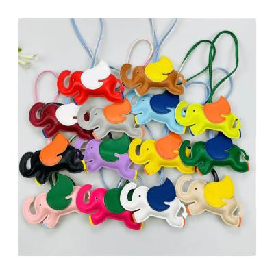 China Custom Bulk Leather Keychains Car Keychain Elephant PU Leather Keychain for sale