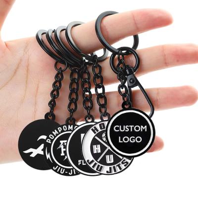 China Customized Key Rings Souvenirs Car Company Logo Key Chain Zinc Alloy Black White Keychain for sale