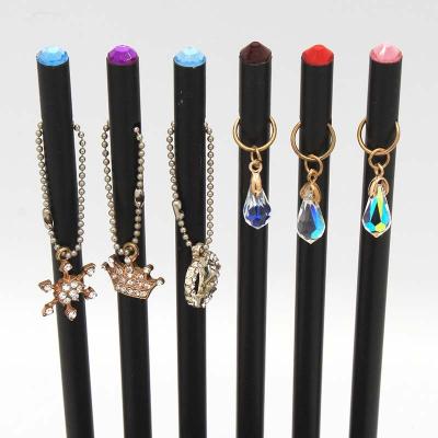 China 100% High Quality Eco-Friendly Luxury Wooden Black Pencils With Wood Dangling Cute Cartoon Novelty Crystal Pencils Gift for sale