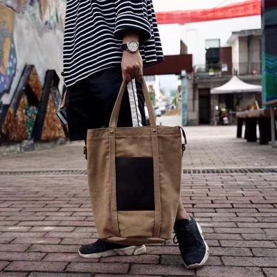 China NATIONAL Heavy Duty Waxed Canvas Tote Bag With Leather Wristbands Custom Vintage Printing for sale