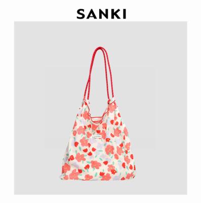 China Folding Fashion Customized Cotton Cloth Floral Pattern Drawstrings Shopping Bag Large Capacity Women's Shoulder Beach Bag Shopping Bag for sale