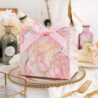 China Small Recyclable Wholesale Custom Pink Wedding Favor Gift Packaging Paper Bag With Ribbon Tie for sale