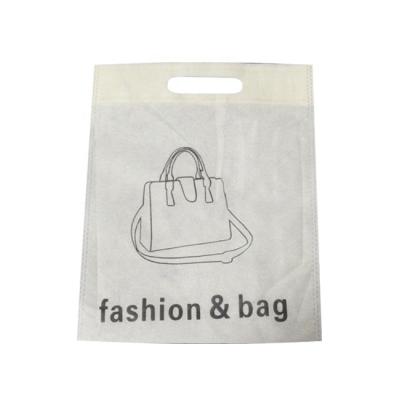 China Factory Custom Wholesale Rope Handle Hole Handle White Nonwoven Garment Packaging Bag for sale