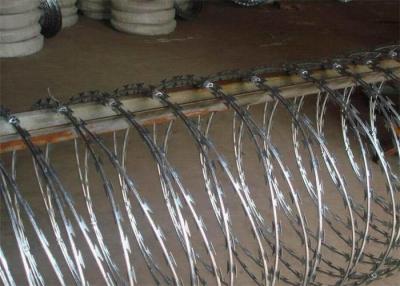 China Hot Dipped Galvanized Concertina Barbed Wire Coil  BTO30 Barb Wire Coil for sale