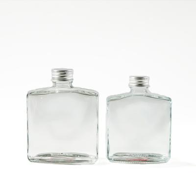 China Modern Custom Design 200ml 250ml Luxury Crystal Glass Rum 100ml Bottles for sale