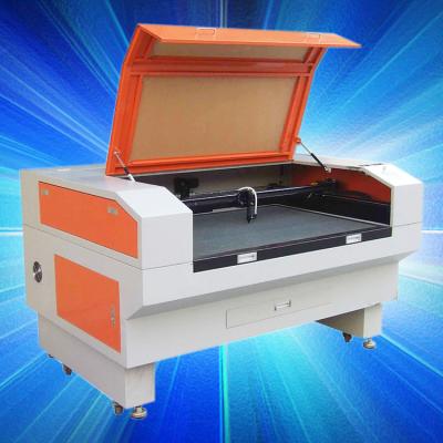 China Laser CUTTING Apparel Garment Fabric CO2 Laser Engraving Leather Acrylic Stone Mexico Turkey Russia India Thailand Cutting Machine Price 1390 for sale