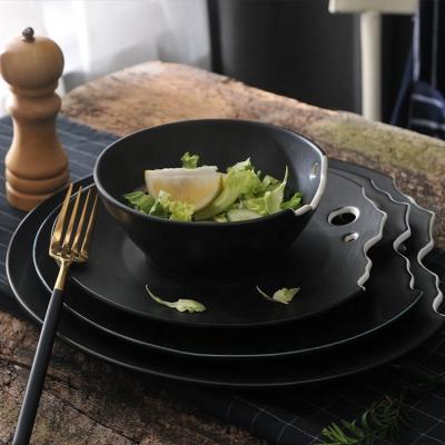 China Sustainable Wholesale Unique Shape Glazed Matte Black Ceramic Dinner Dishes For Restaurant for sale